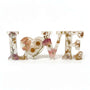 Whispering Meadow LOVE resin word art with white daisies, blush pink and purple wildflowers, bunny tail, and gold leaf flakes