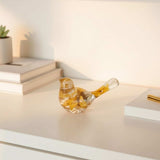 Sunflower resin bird decor with clear body, embedded real dried yellow sunflower petals, and gold leaf accents.