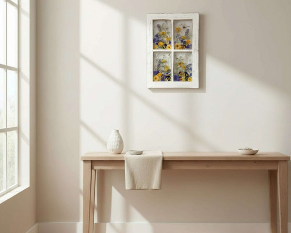 Pressed Flower Window Frame wall art in white distressed wood, with four clear panes of colorful pressed flowers and a dragonfly.