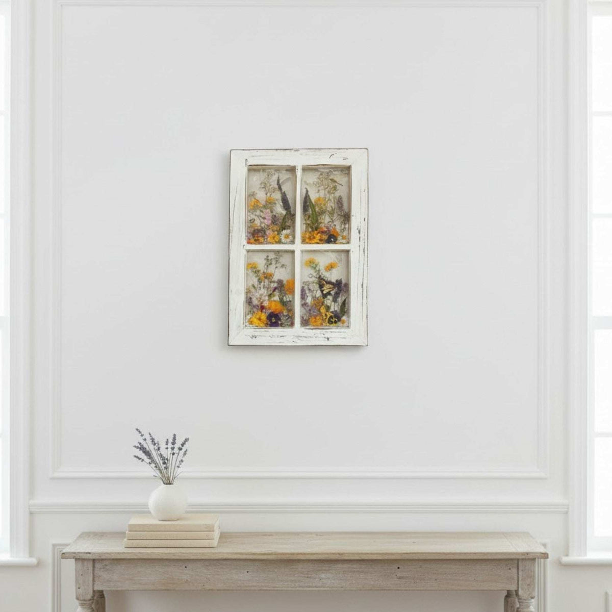 Pressed Flower Window Frame wall art with real dried wildflowers and insects in clear resin panes set in a distressed white wood frame.